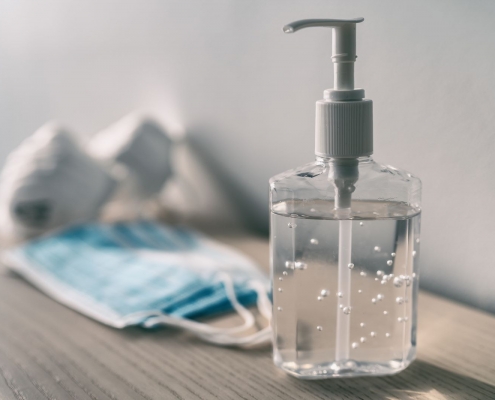 hand sanitizer and mask
