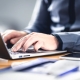 Person typing on computer learning about the Secure 2.0 Act chnages.